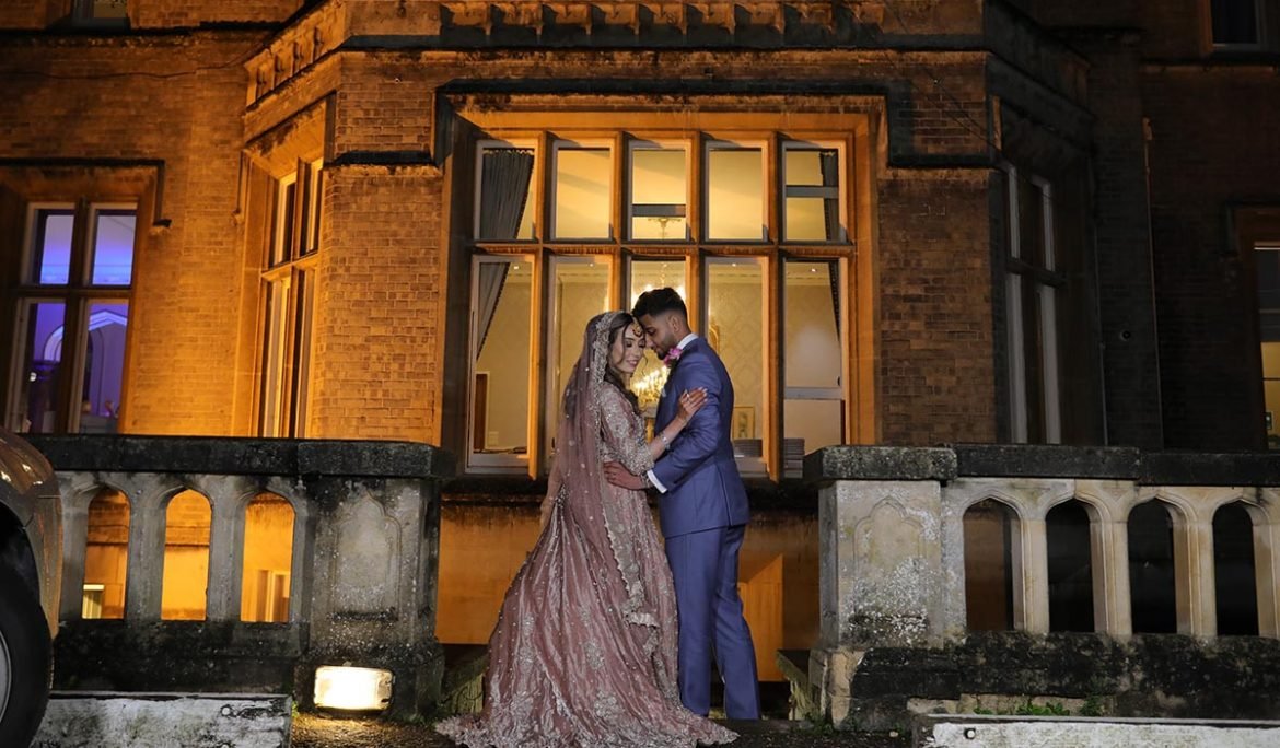 Romantic Muslim wedding couple portrait outside the wedding venue in London