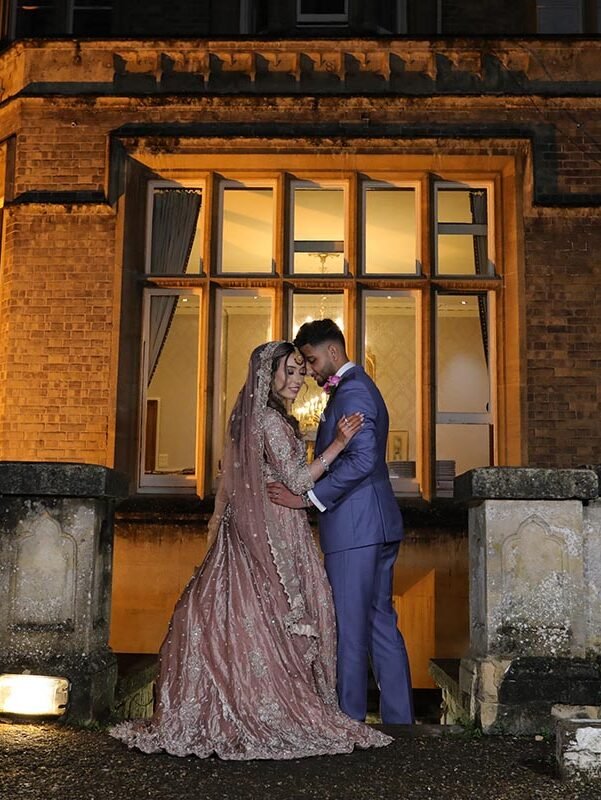 Romantic Muslim wedding couple portrait outside the wedding venue in London