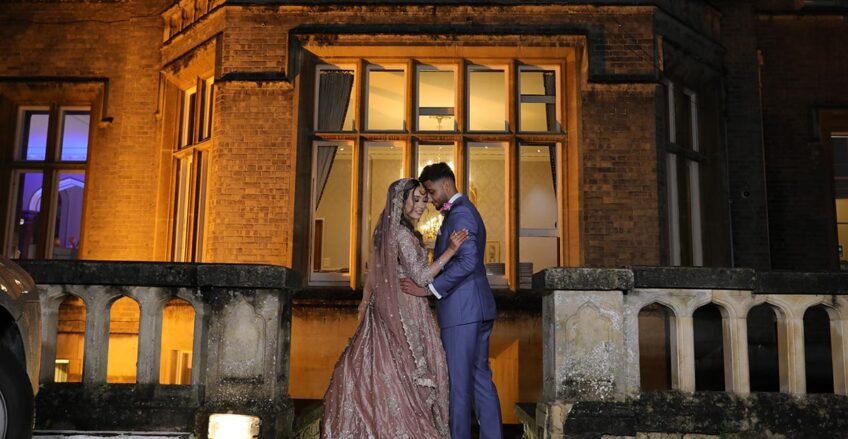Romantic Muslim wedding couple portrait outside the wedding venue in London